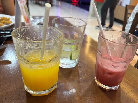 Refreshing drinks on a wooden table Stock Photos