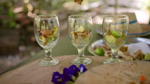 Refreshing ginger lemongrass drink preparation with turmeric in a master class Stock Footage 301541383