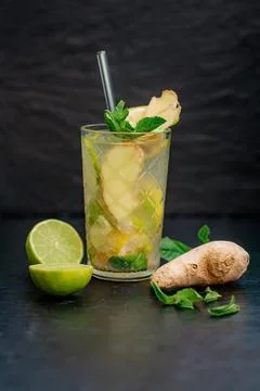Refreshing ginger, lime, lemon and mint lemonade in transparent glass Stock-Fotos