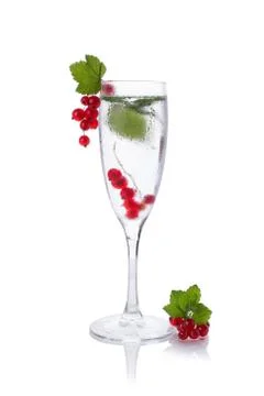 Refreshing glass of water with  Red currant isolated on white in a glass Stock Photos