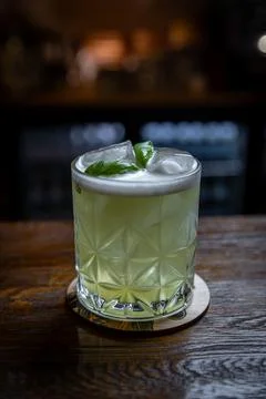 Refreshing green basil cocktail Stock Photos