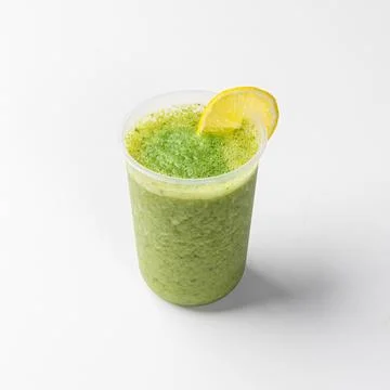 Refreshing Green Smoothie with Lemon Slice and Spinach Leaf Stock Photos
