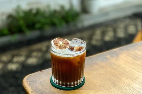 Refreshing Guava Iced Coffee with Dried Lime Garnish Stock Photos