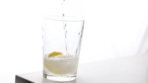 Refreshing healthy drink with Lemon, sparkling water Stock Footage 146412807