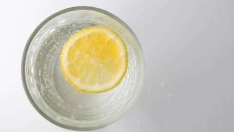 Refreshing healthy drink with Lemon, sparkling water Stock Footage 146412873