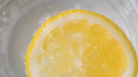 Refreshing healthy drink with Lemon, sparkling water Stock Footage 146413013