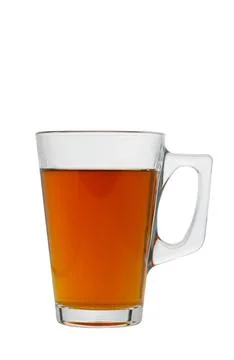 Refreshing herbal infusion in a clear mug on a minimalist table Stock Photos