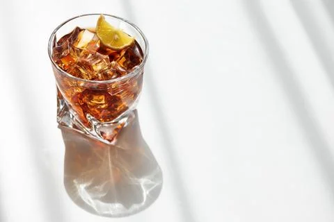 Refreshing iced coffee drink with lemon and ice Stock Photos