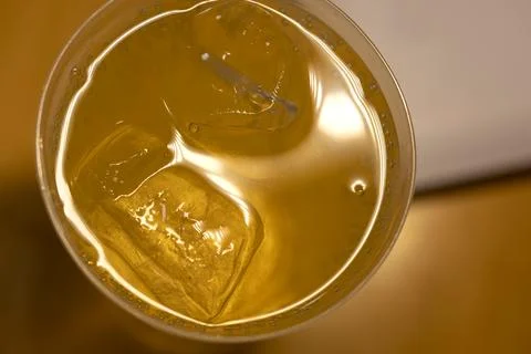 Refreshing iced tea with ice cubes in glass Stock Photos