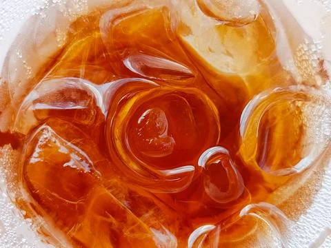 Refreshing Iced Tea with Ice Cubes Close Up, Cold Beverage Background Фото