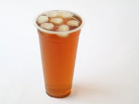 A refreshing iced tea served in a convenient plastic cup Stock Photos