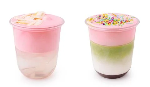 Refreshing layered drinks with sweet pink cream topping and colorful sprinkle Stock Photos