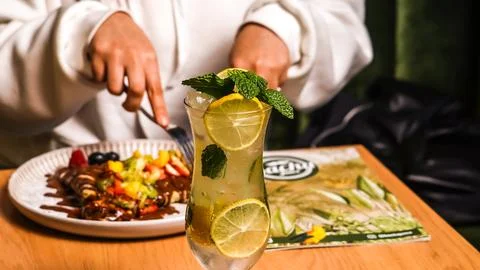 Refreshing Lemon Mint Drink and Casual Dining Scene Morocco April 23,2026 Stock Photos
