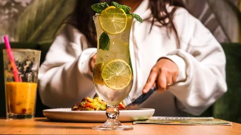 Refreshing Lemon Mint Drink and Casual Dining Scene Morocco April 23,2026 Stock Photos