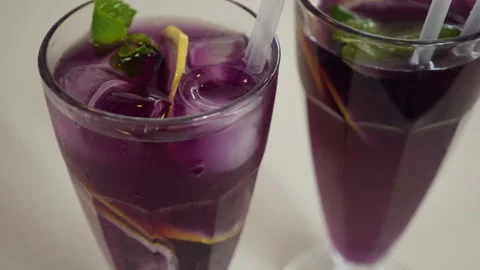 Refreshing lemonade infused with aromatic lavender and anchan tea for an interes Stock Footage 239925538