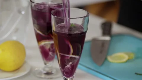 Refreshing lemonade infused with aromatic lavender and anchan tea for an interes Stock Footage 239925541