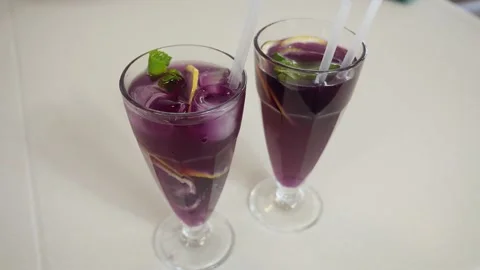 Refreshing lemonade infused with aromatic lavender and anchan tea for an interes Stock Footage 239925553