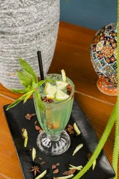 Refreshing mint and lime drink served in a restaurant setting 库存照片