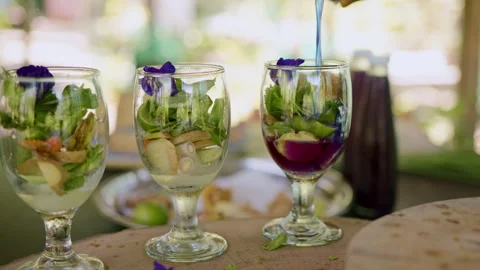 Refreshing mint ginger drink preparation with natural ingredients in a glass Stock Footage 301571283