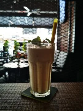 Refreshing Mint Milkshake Served in Cafe Setting Stock Photos