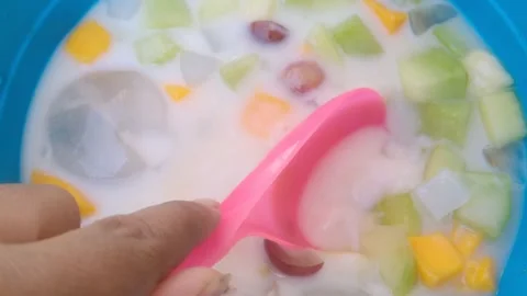 Refreshing Mixed Fruit Ice in Big Bowl Perfect for Sharing Stock Footage 345467471