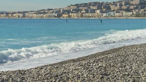Refreshing ocean wave at stony beach Stock Footage 334656581