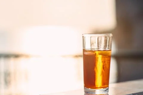 A refreshing orange spritz cocktail served with ice in a tall glass Stock Photos
