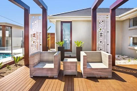 A refreshing outdoor seating area Stock Photos