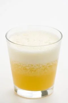 Refreshing pineapple and orange milkshake Stock Photos