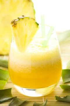 Refreshing pineapple and orange milkshake Stock Photos