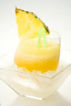 Refreshing pineapple and orange milkshake Stock Photos