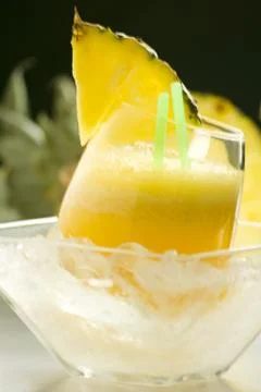 Refreshing pineapple and orange milkshake Stock Photos