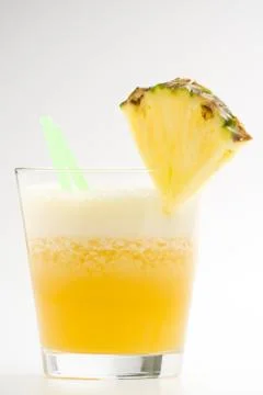 Refreshing pineapple and orange milkshake Stock Photos