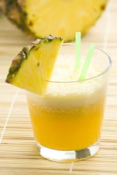 Refreshing pineapple and orange milkshake Stock Photos