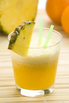 Refreshing pineapple and orange milkshake Stock Photos