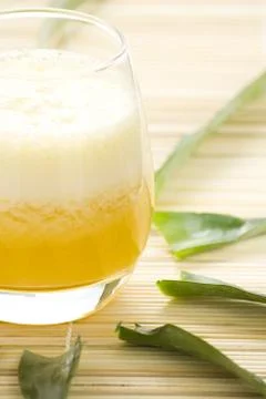 Refreshing pineapple and orange milkshake Stock Photos