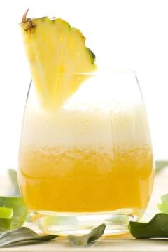 Refreshing pineapple and orange milkshake Stock Photos