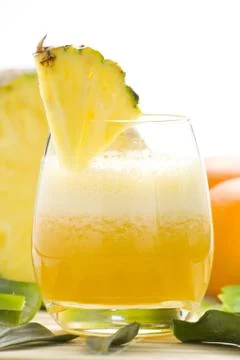 Refreshing pineapple and orange milkshake Stock Photos