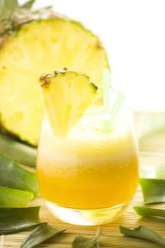 Refreshing pineapple and orange milkshake Stock Photos