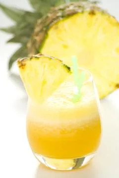 Refreshing pineapple and orange milkshake Stock Photos