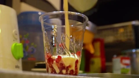 Refreshing Pomegranate Smoothie Stock Footage 318303750