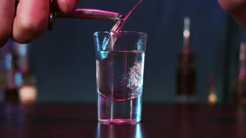 A Refreshing Pour: The Art of Bartending and Cocktail Creation Stock Footage 255015372