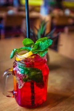 Refreshing Raspberry Non-Alcoholic Cocktail With Mint Garnish and Lemon Stock Photos