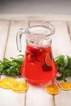 Refreshing red citrus lemonade with mint slices Stock Photos