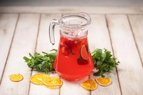Refreshing red citrus lemonade with mint slices Stock Photos
