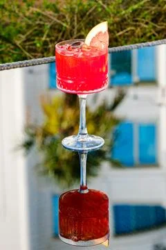 Refreshing Red Cocktail with Grapefruit Slice 写真素材