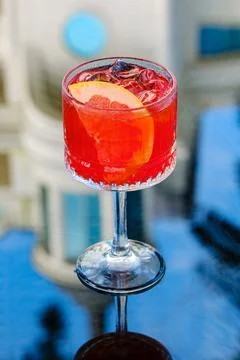 Refreshing Red Cocktail with Grapefruit Slice Fotos de archivo