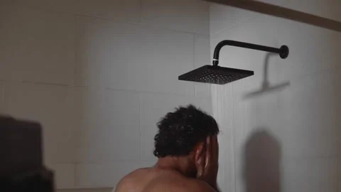 Refreshing shower routine with water flowing Stock Footage 336974643