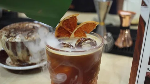 Refreshing Smoke-Infused Beverages: A Visual Delight Stock Footage 244319228