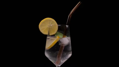 Refreshing soda cocktail with mint and lemon slow motion  Stock Footage 150455306